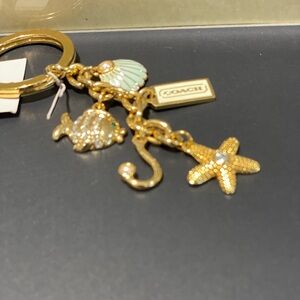 Coach Seaside gemstone fob